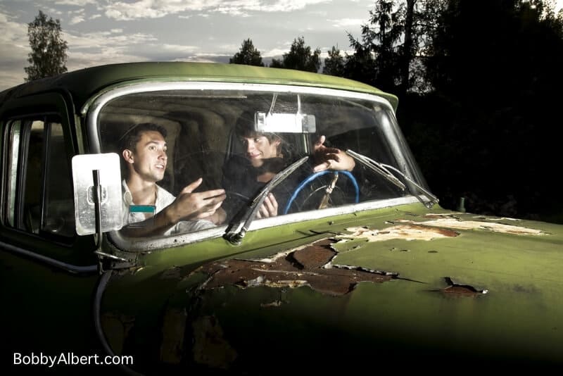 Principle vs. expediency teaches us to make decisions before we are in emotional circumstances! Guys in old truck talking and displaying the concept of principle vs expediency